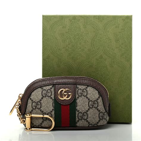 white gucci key pouch